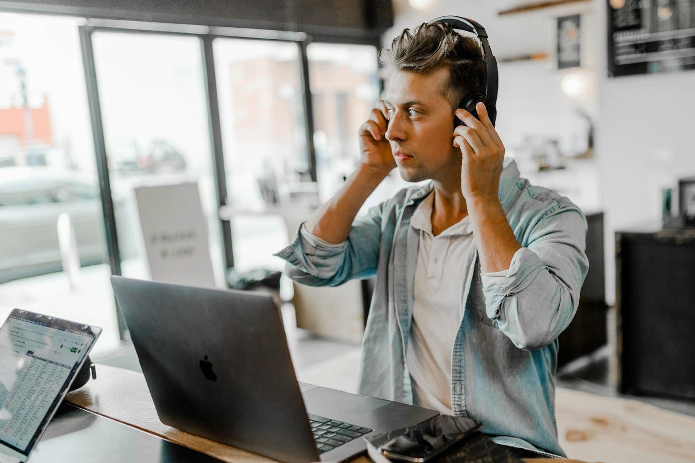 An OxaHost support engineer at their workstation